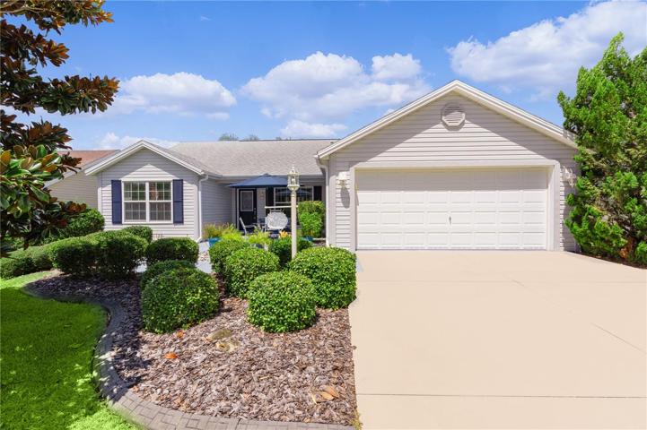 Welcome to this charming Bougainvillea 3-bed 2-bath home that effortlessly combines comfort and outdoor leisure in the village of Bonita.