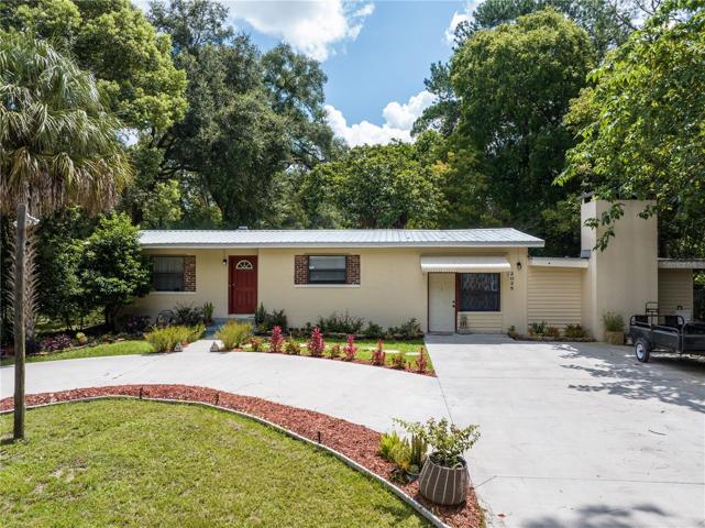No maintenance concrete block with a metal roof! Concrete driveway with ample parking.