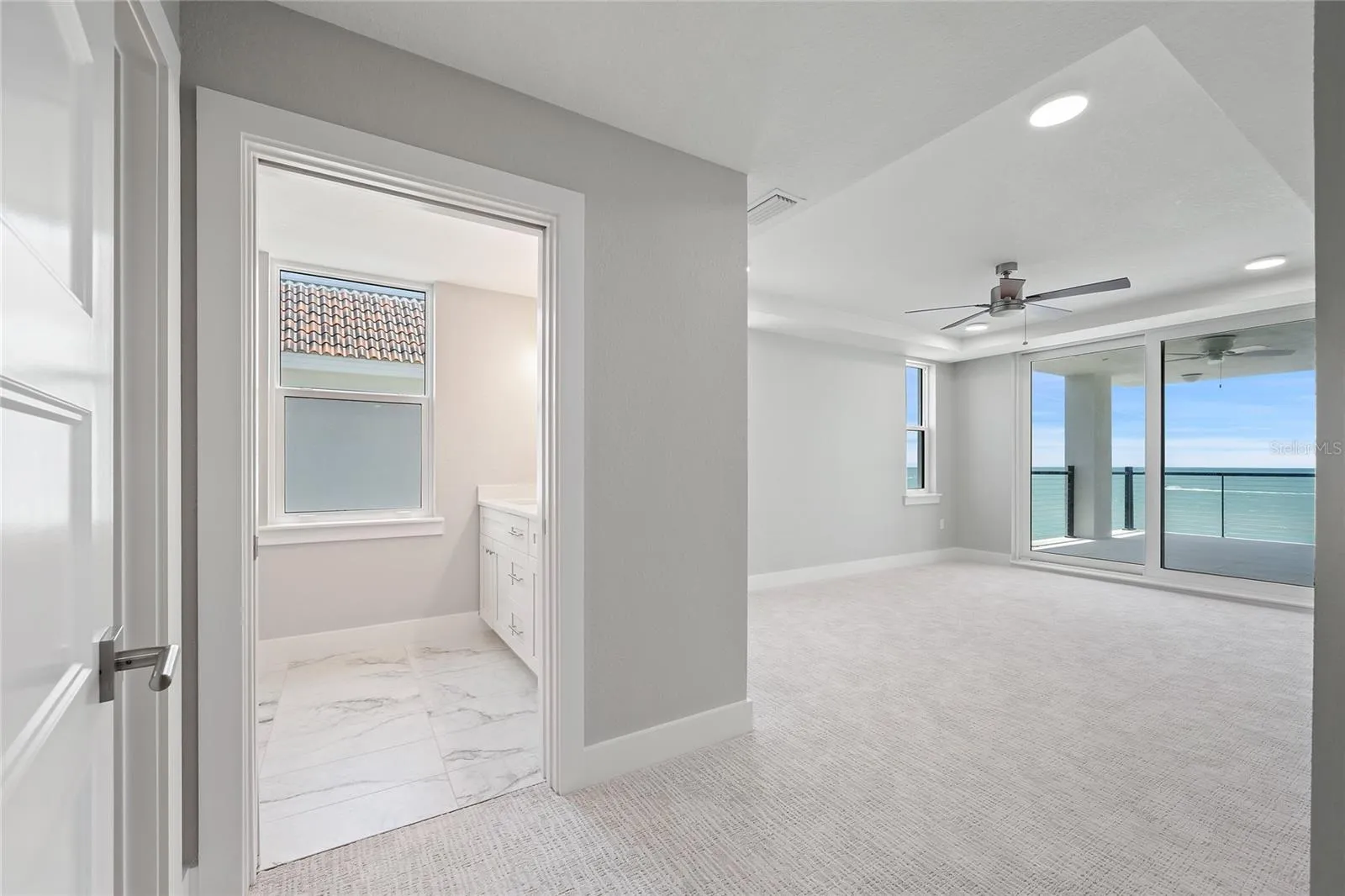 Primary with sliders to balcony
