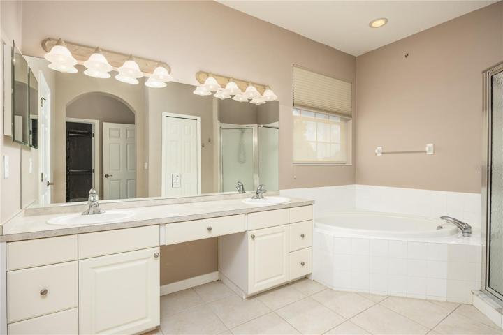 Master Bath has dual vanities, soaking Tub and Step In Shower!