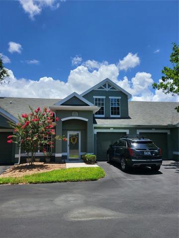 Front view with oversized 2 car garage on a dead end street where it's nice and quiet.
