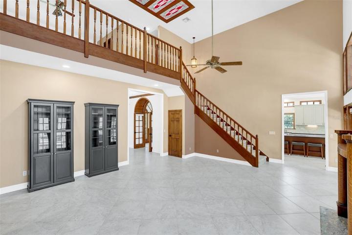 Staircase to large loft and 3 Guest Bedrooms
