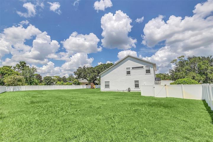 Fully fenced rear yard and 2 BR Guest House 3 Car Garage