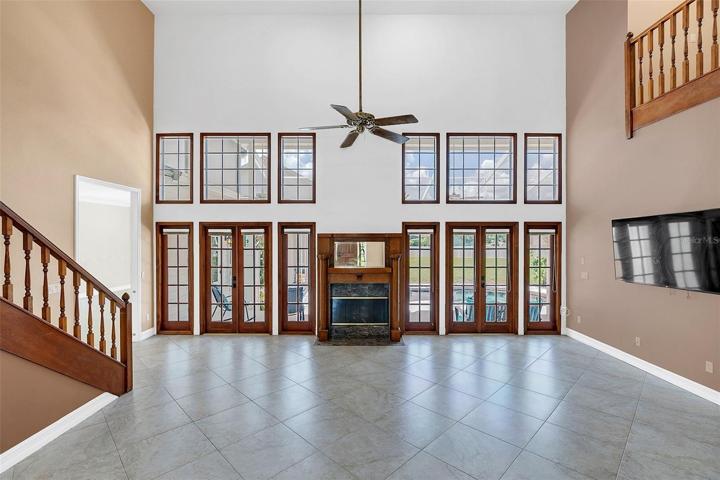Great Room VIEWS to POOL & Beautiful French Doors and Fireplace