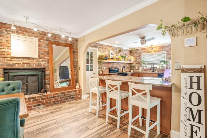 Kitchen / Dining area with wood burning fireplace