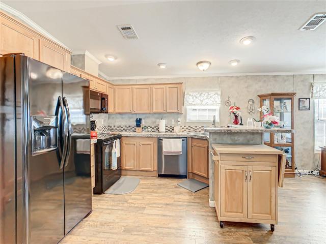 Kitchen with updated dishwasher and microwave