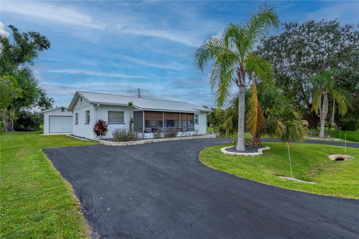 Your new FLORIDA Home. Circular driveway. Beautiful Palm Trees!