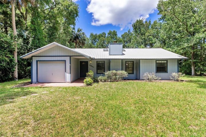 3/2/1 home on 1 acre parcel.