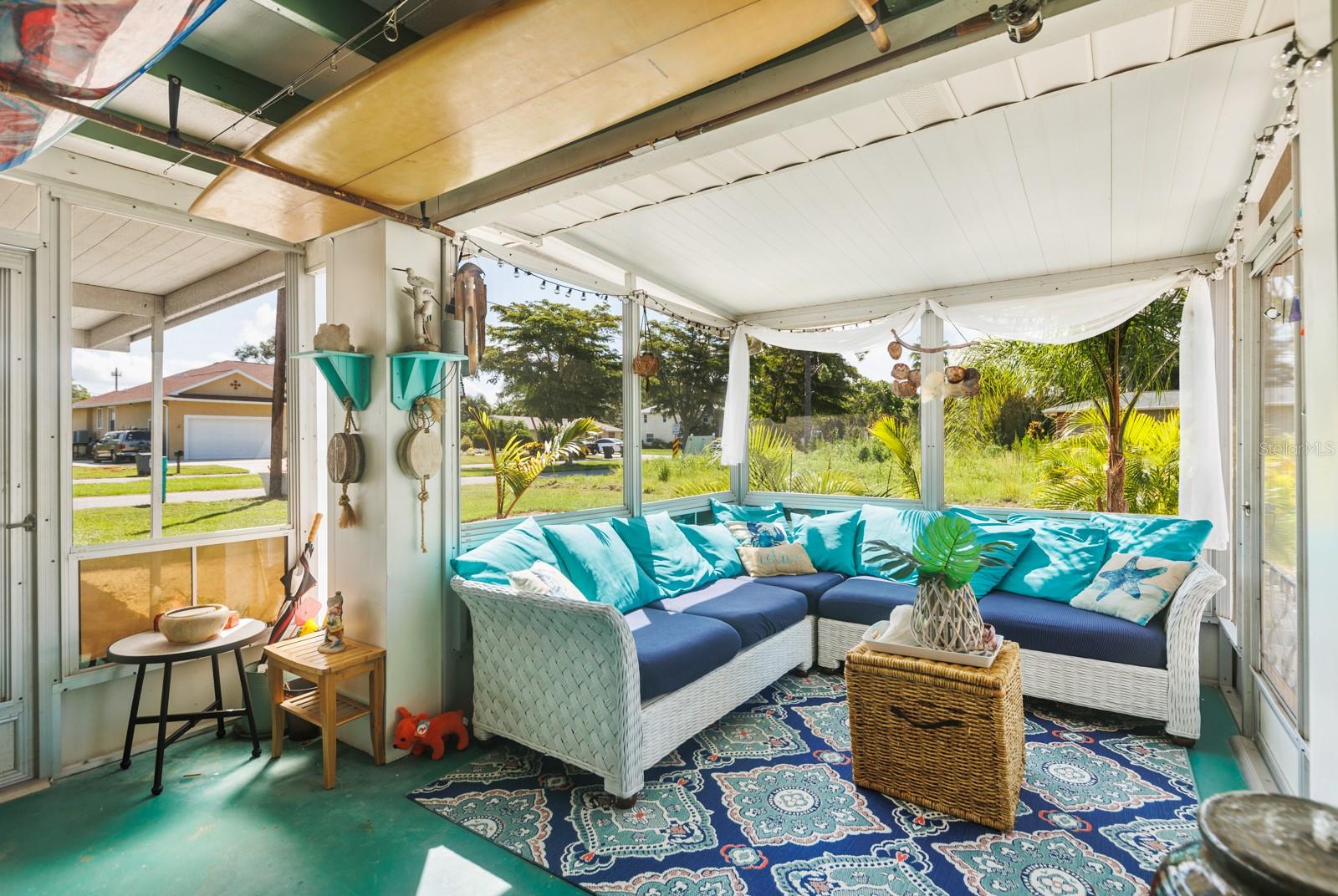 Enjoy your morning coffee or afternoon adult beverage on this cozy lanai.
