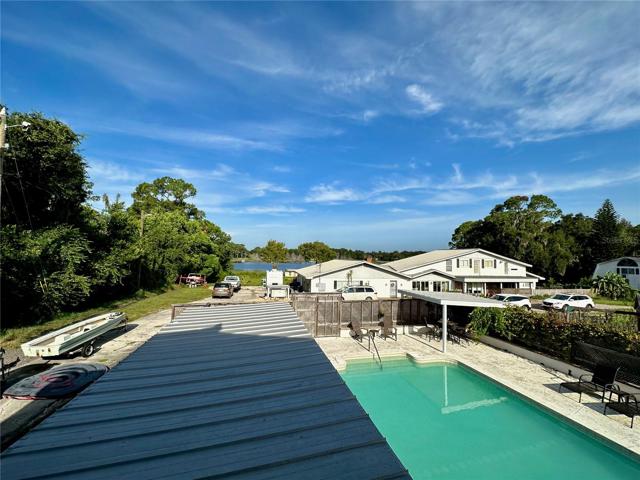 Pool Area looking toward House