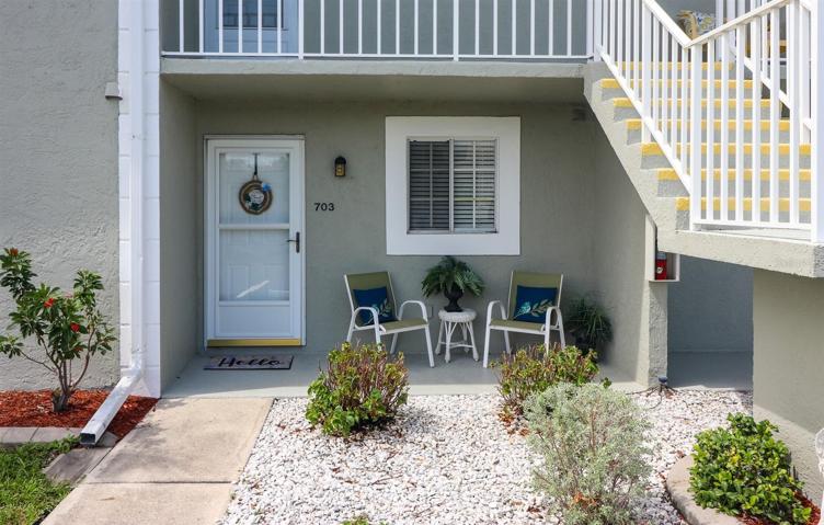 Unit 703 Floor 1, 2 bed/2 bath, >1000 sq ft, covered lanai on lake