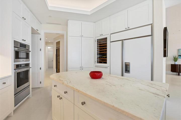 Italian Marble & Sub-Zero Refrigerators