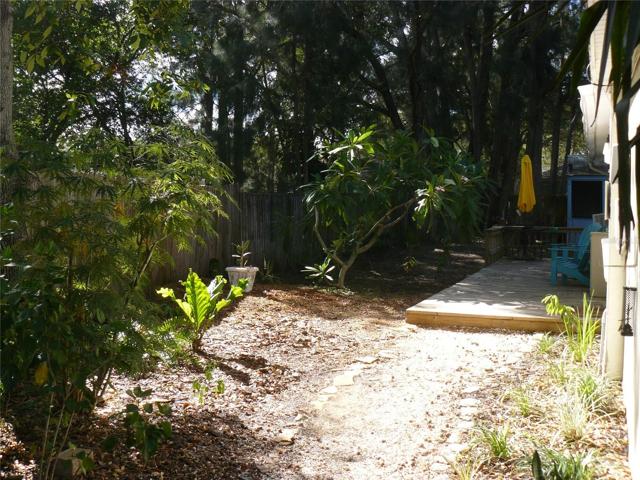 Walkway to 2 bed front door