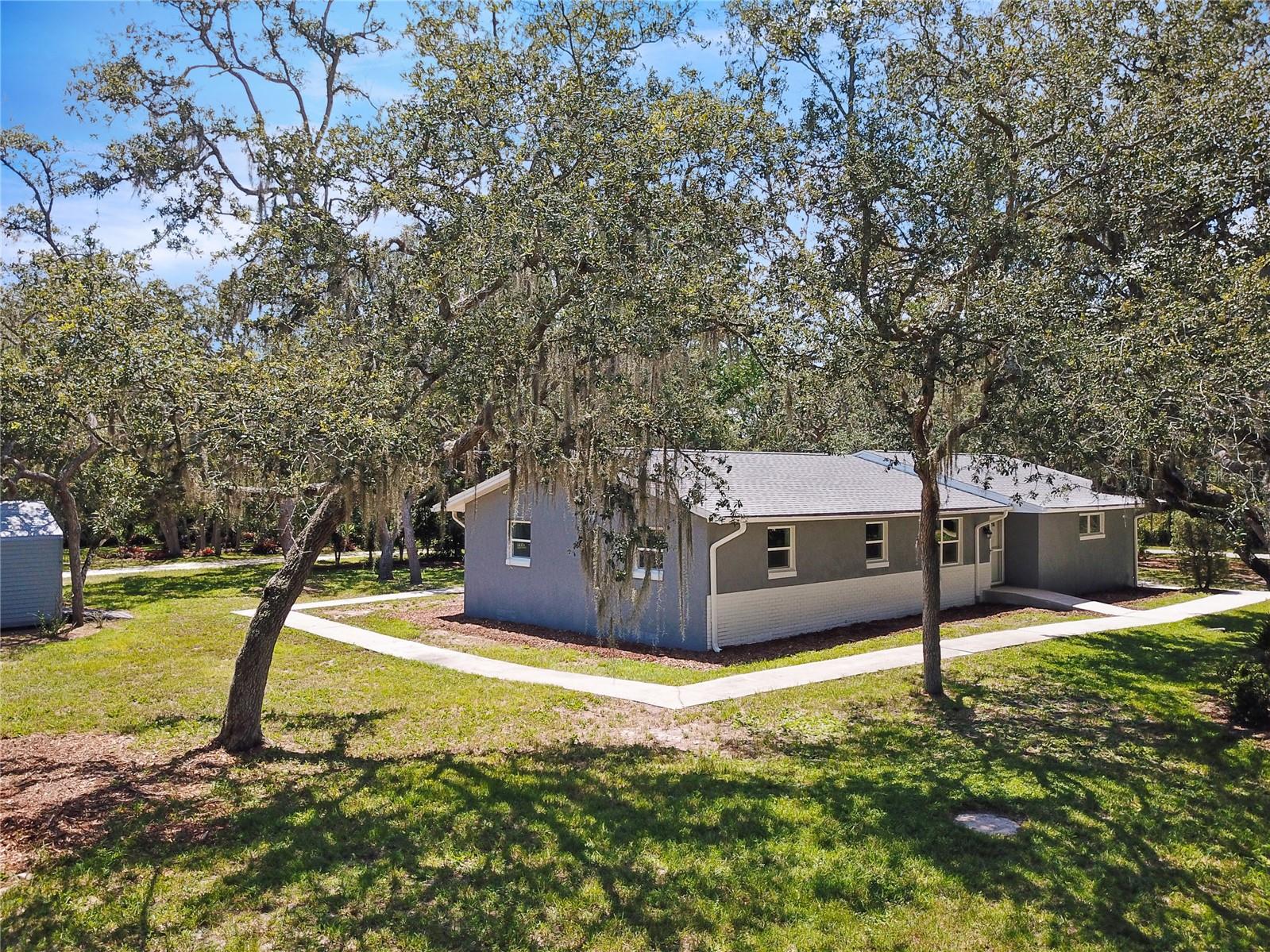 **WELCOME HOME** Solid Block Construction home with a New Roof, New Stucco, Freshly Painted, Completely Renovated with a New Kitchen, New Bathrooms, New Windows, New Flooring, Updated Electrical and everything else you could ask for!