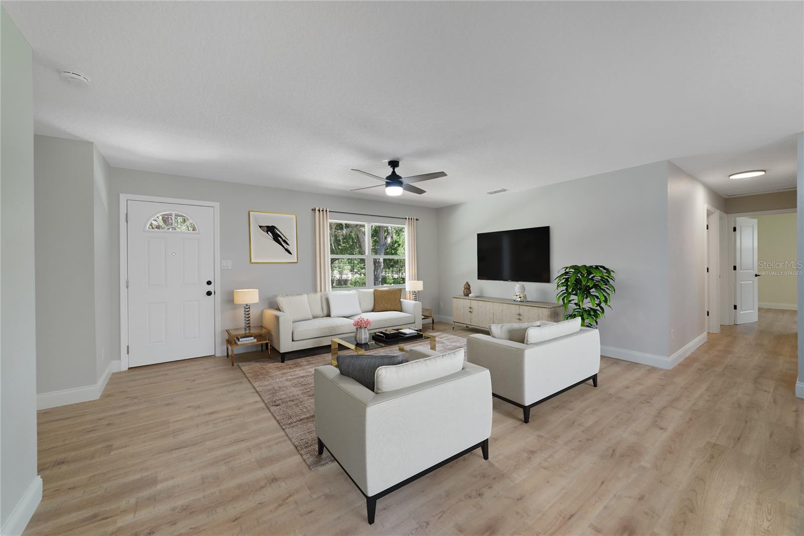 Everything has been updated with impeccable detail from the NEW ROOF, NEW KITCHEN &amp; BATHS, all NEW FLOORING, fresh paint inside and out, NEW WINDOWS, new stucco, a NEW WATER HEATER - even the landscaping got a refresh, making this beautiful home MOVE-IN READY for its new owner! Virtually Staged.