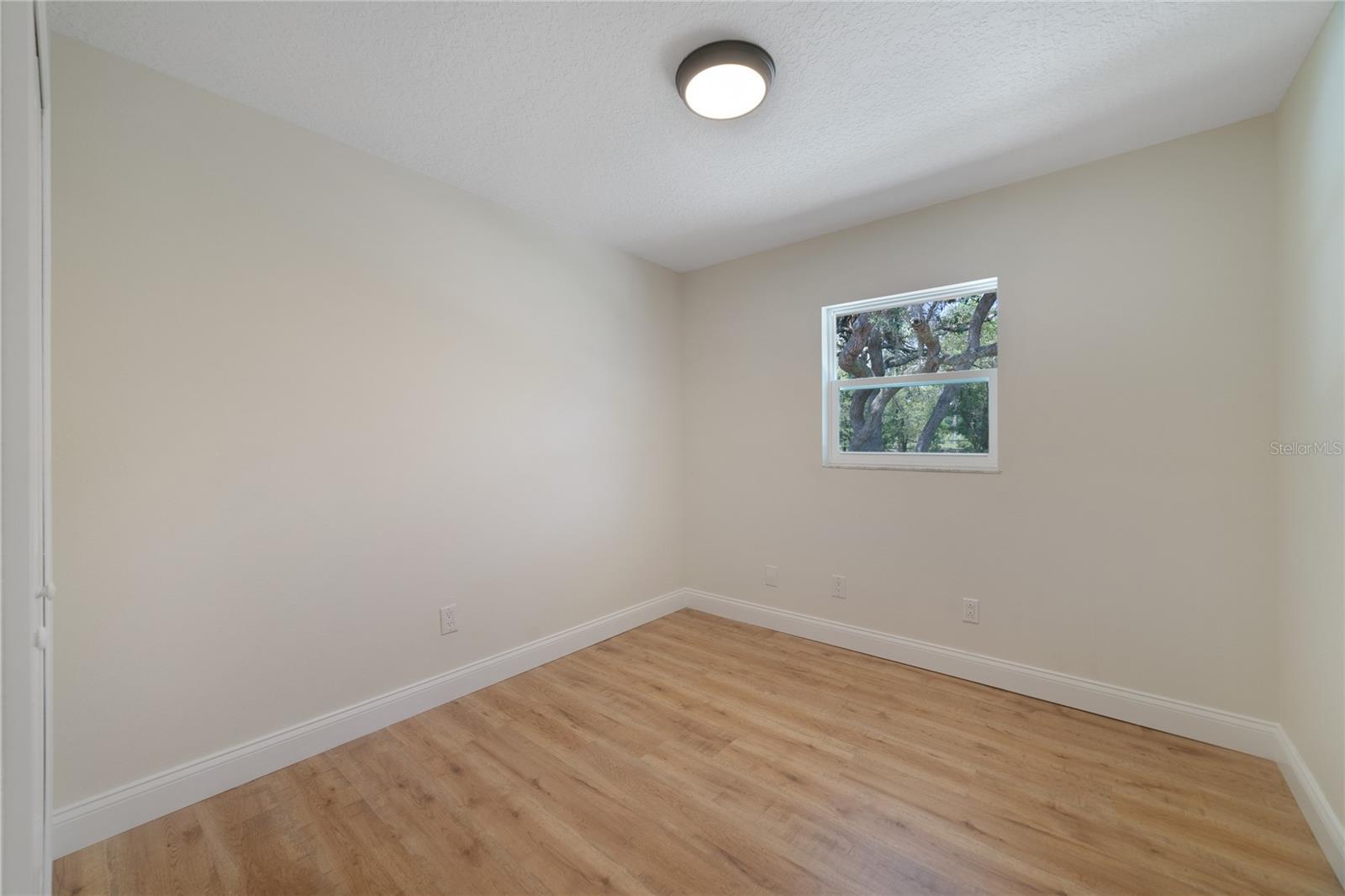 SECOND BEDROOM.