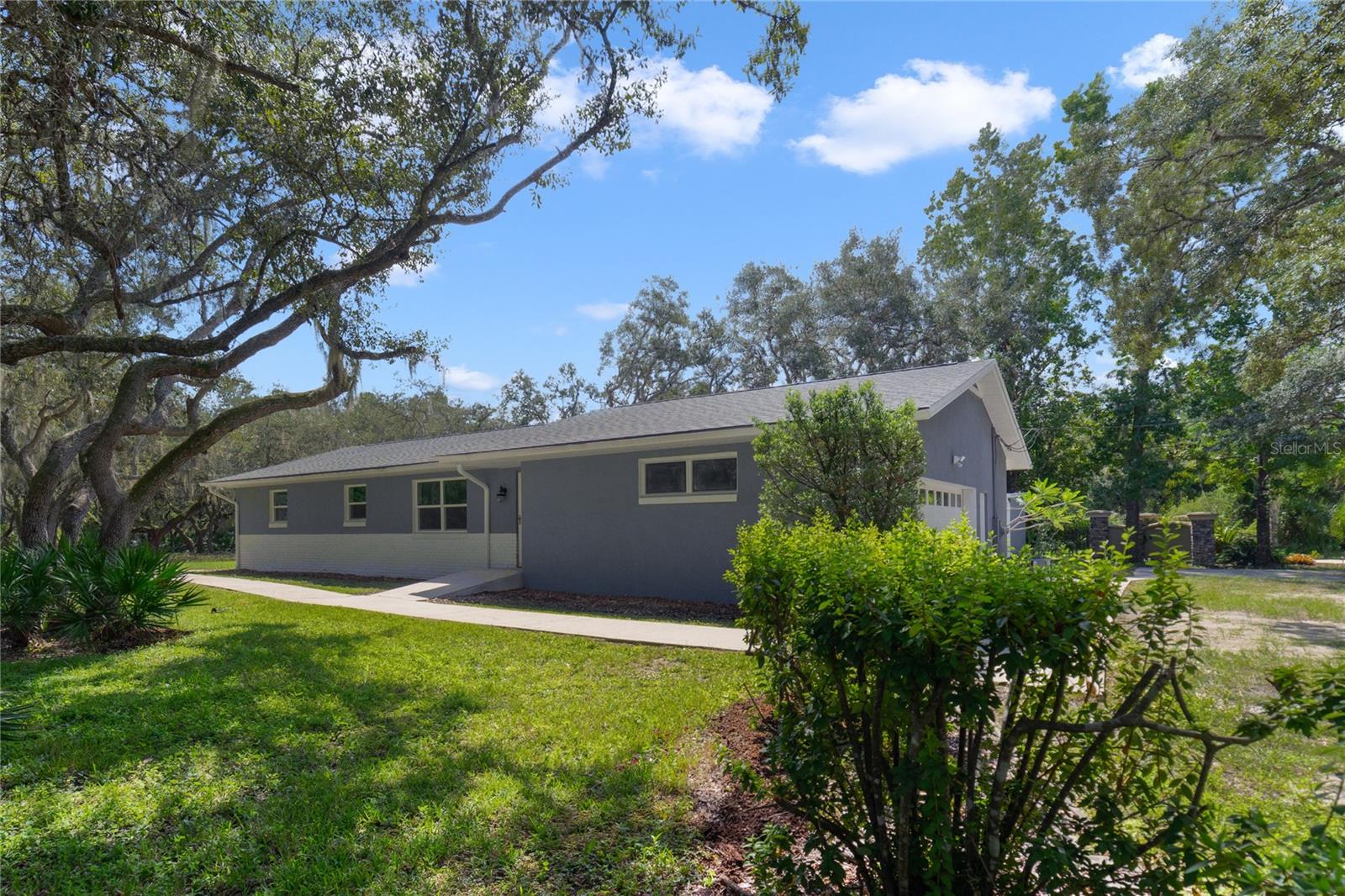 Solid Block Construction home with New Roof, New Stucco and freshly painted
