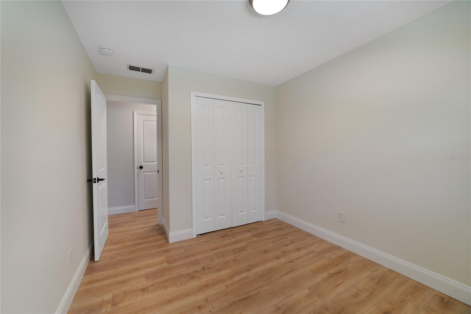 SECOND BEDROOM.