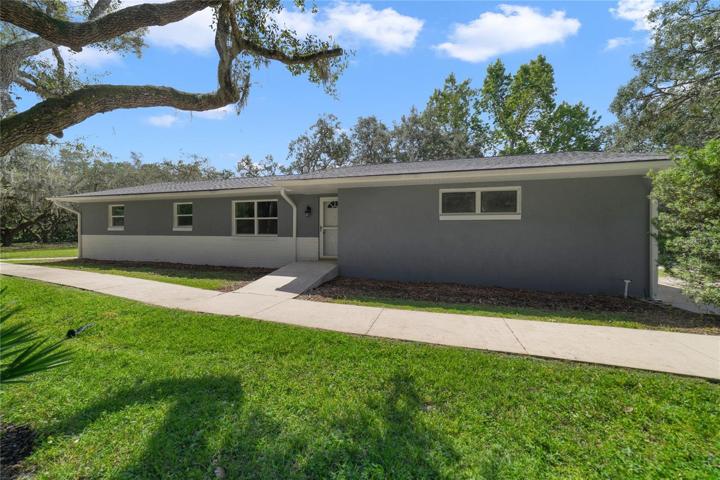 Solid Block Construction home with New Roof, New Stucco and freshly painted