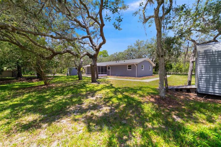 The backyard feels private and endless and there is a SHED for storage in addition to the pristine 2-CAR GARAGE!