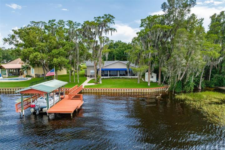 Lake View to the rear of the house, Boat House, Dock (Boat not included)