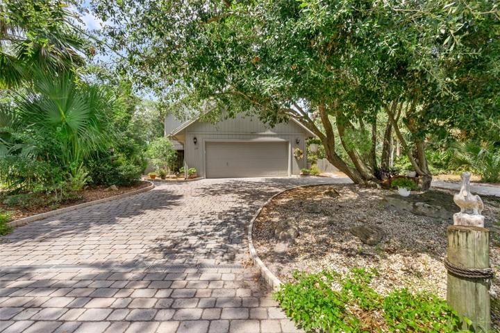 Shaded, paver driveway