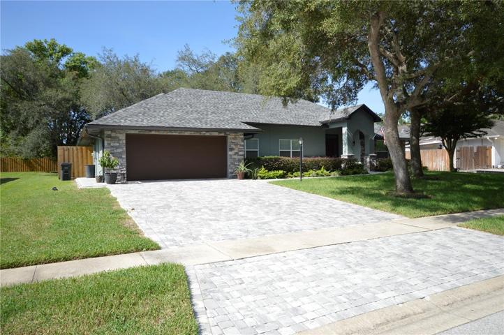 Paved driveway and walkway and added a front porch