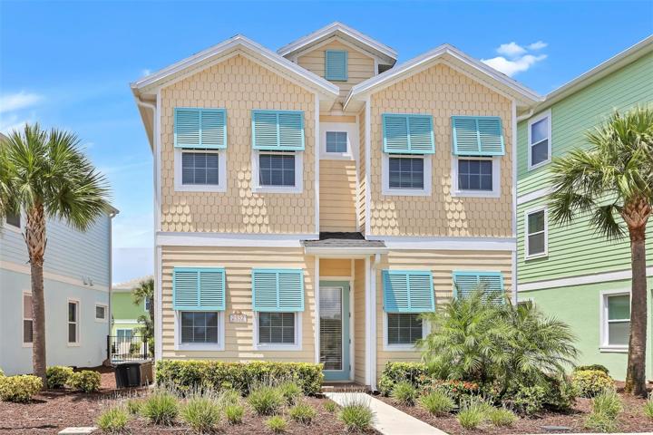 Gorgeous Coastal elevation with decorative metal shutters.