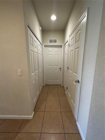 Hall to Bedroom #2, bathroom #2 and Laundry Room