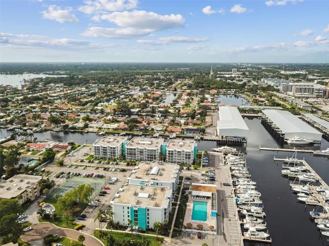 The community pool lies alongside and overlooks Maximo Marina and Tiki Docks Bar + Grill