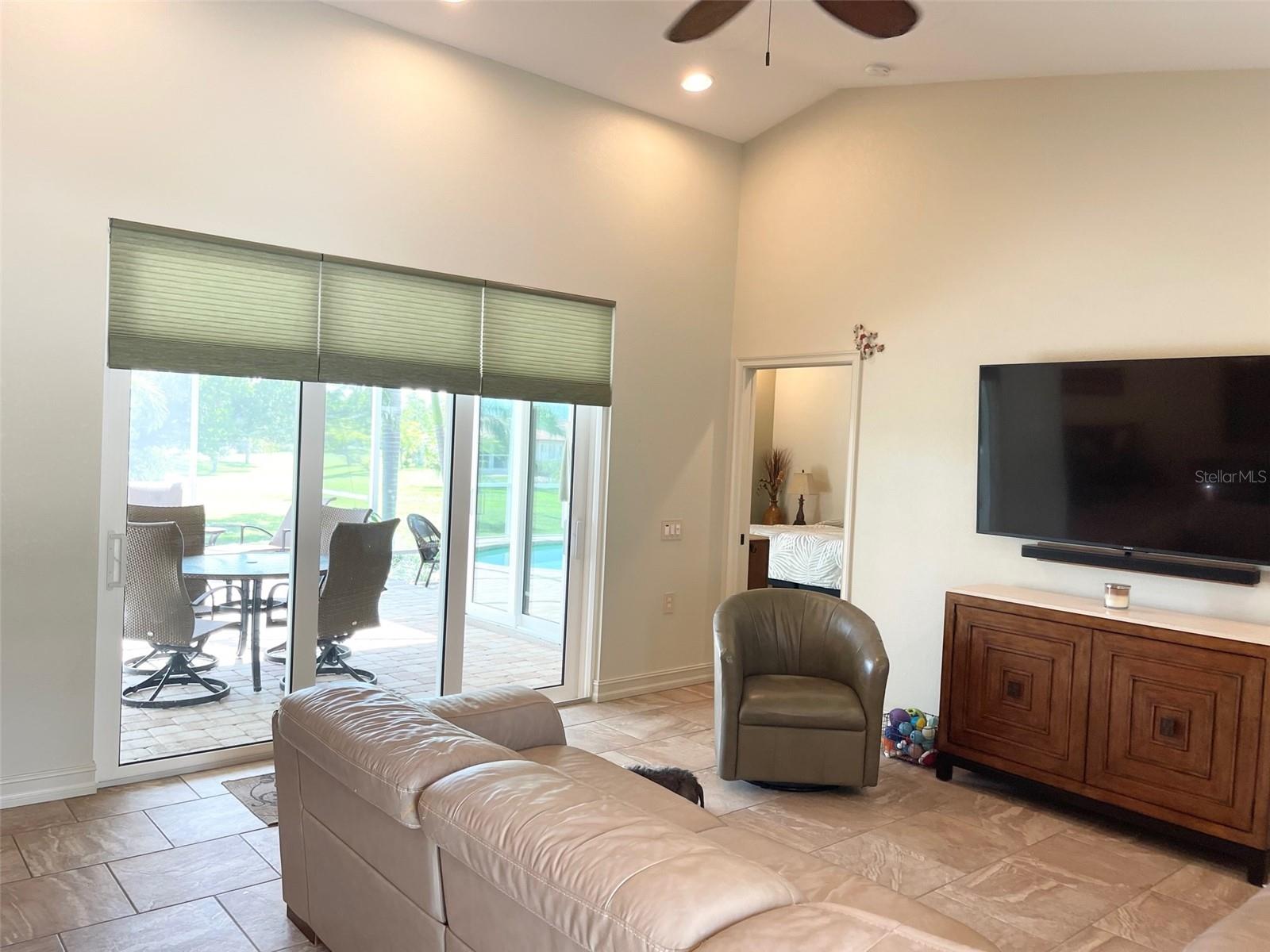 TRIPLE SLIDERS, ( ALL IMPACT GRADE) TO LANAI AND POOL - HONEYCOMB BLINDS