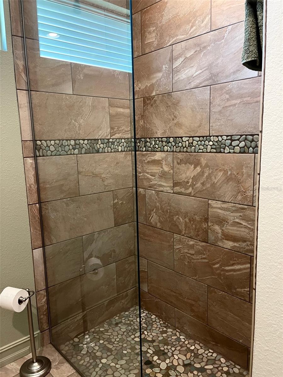 WINDOW AND HALF GLASS WALL  ( NO SHOWER CURTAIN NEEDED!)