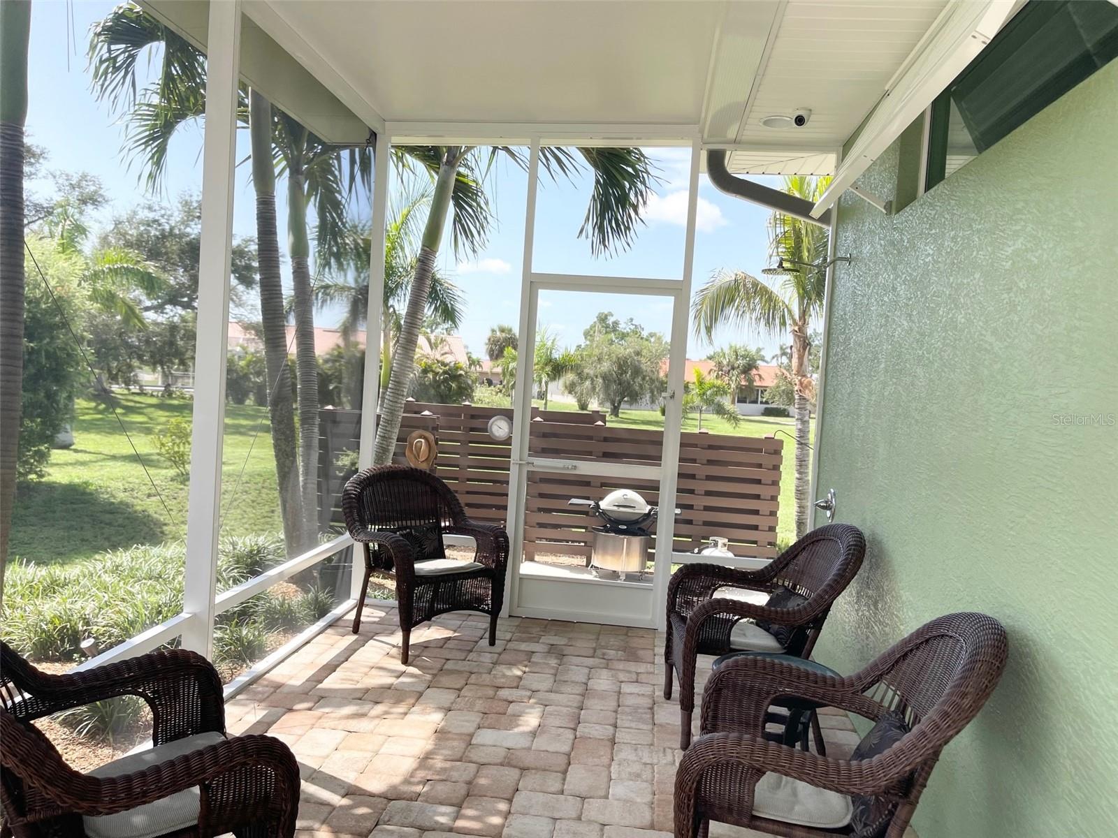 BONUS, COVERED SCREENED AREA TO THE RIGHT OF POOL FOR RELAXING, ALSO WONDER OUTSIDE SHOWER FEATURE, FOR A QUICK SHOWER BEFORE OR AFTER YOUR SWIM!