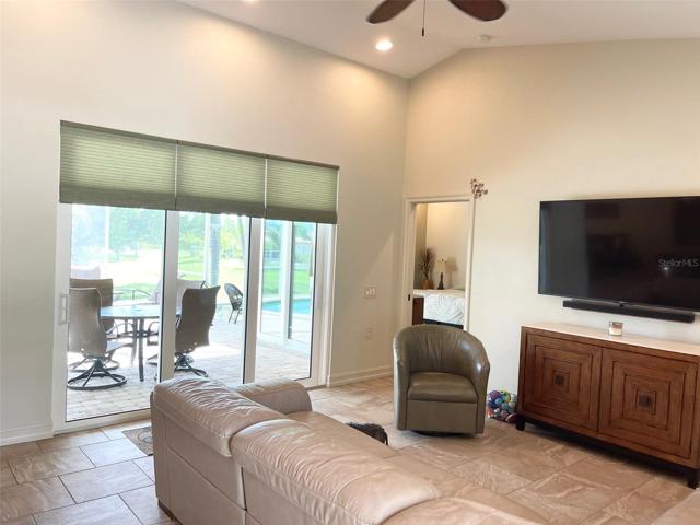 TRIPLE SLIDERS, ( ALL IMPACT GRADE) TO LANAI AND POOL - HONEYCOMB BLINDS