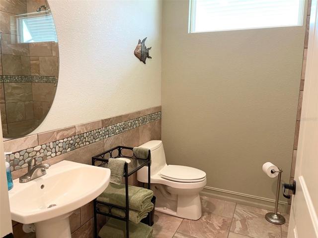 GUEST BATH - TILED FLOOR AND WALL