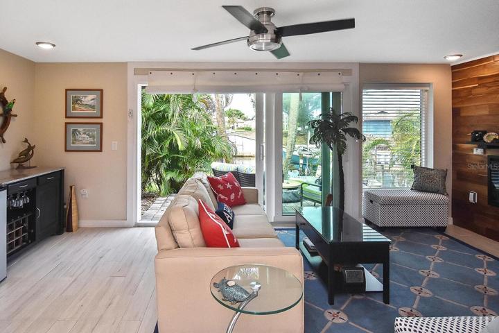 Den with slider to outdoor patio