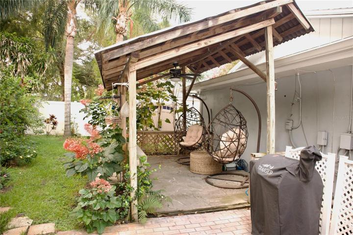 Outdoor Seating Area with Ceiling Fan and Lights