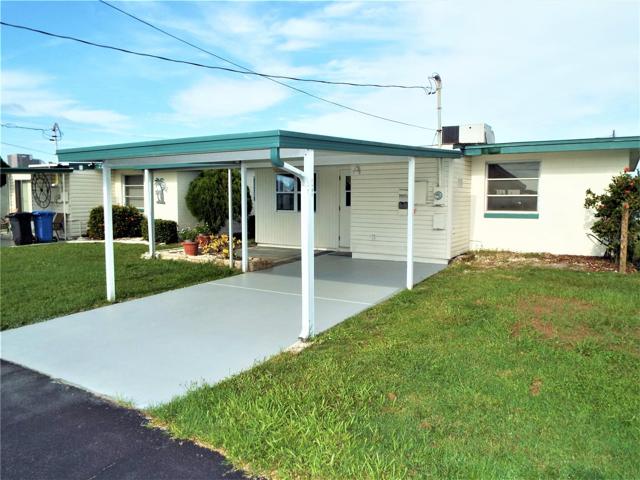 View of carport and driveway