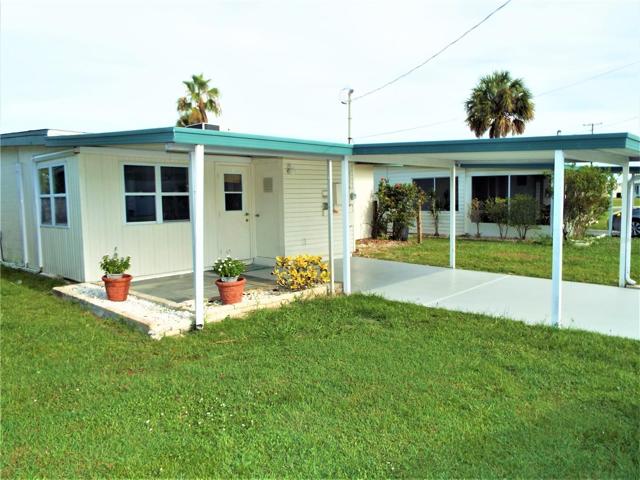 View of carport and driveway