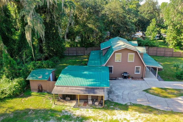 The Garage Roof, Rafters, & Overhead Lighting are all NEW from 2020.  Pump House behind garage has NEW ROOF & DOOR from 2022.