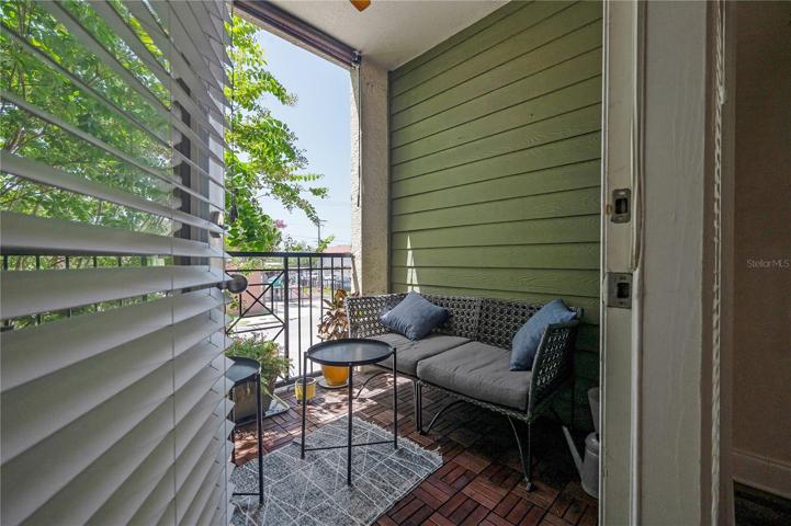 Unit Balcony w/ceiling fan.