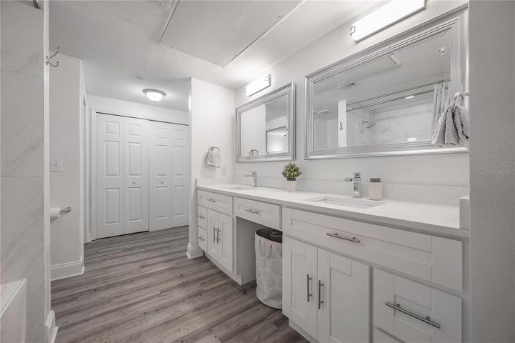 Two entrances to bathroom. One from bedroom, and one from living room for guests.