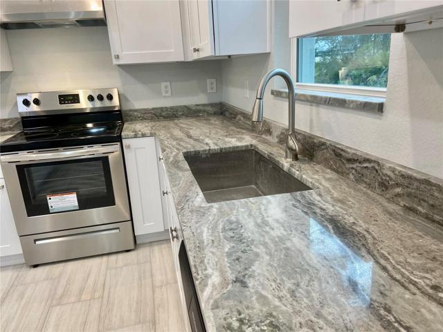 Granite Counter with farmhouse sink