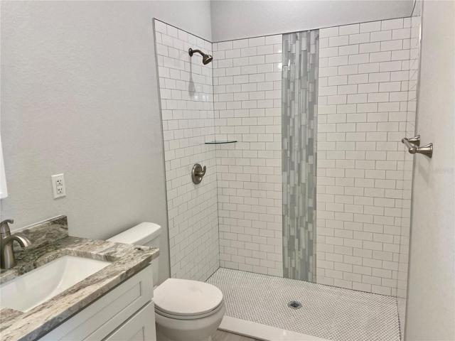 Master bath walk-in tiled shower