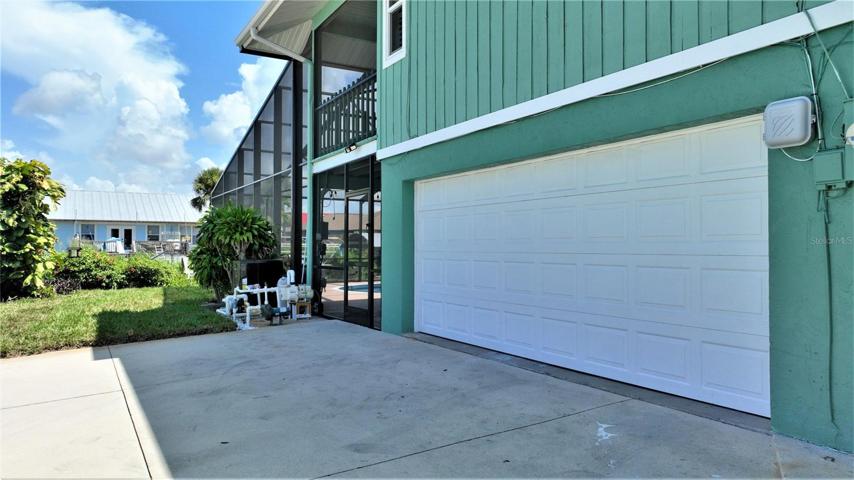 Side entry garage and extra garage area for golf cart or 3rd carl