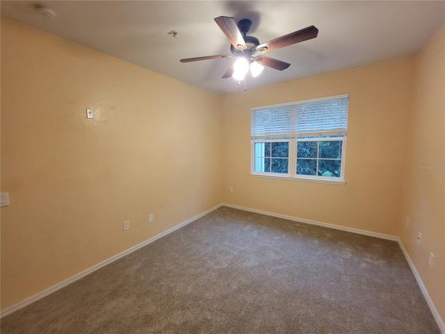 4th Bedroom - can see golf course through trees