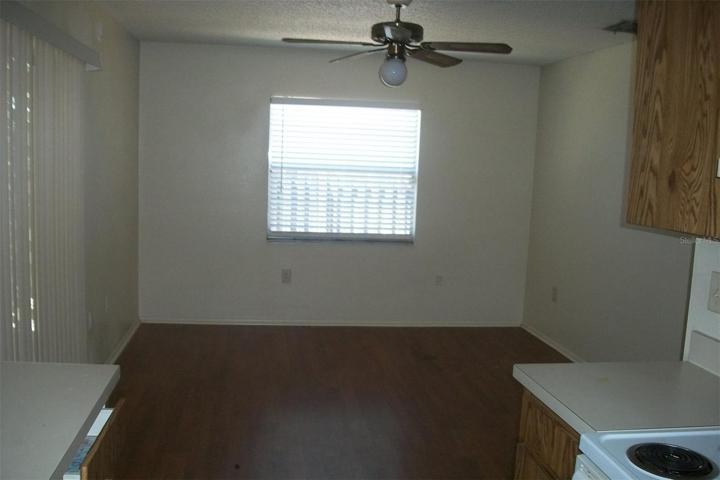 Standing in Kitchen looking into Family Room