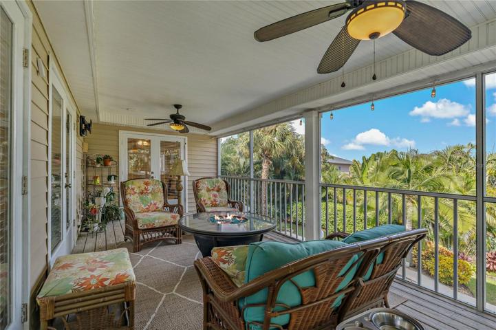COVERED AND SCREENED IN BALCONY ON THE MAIN FLOOR OF HOME!
