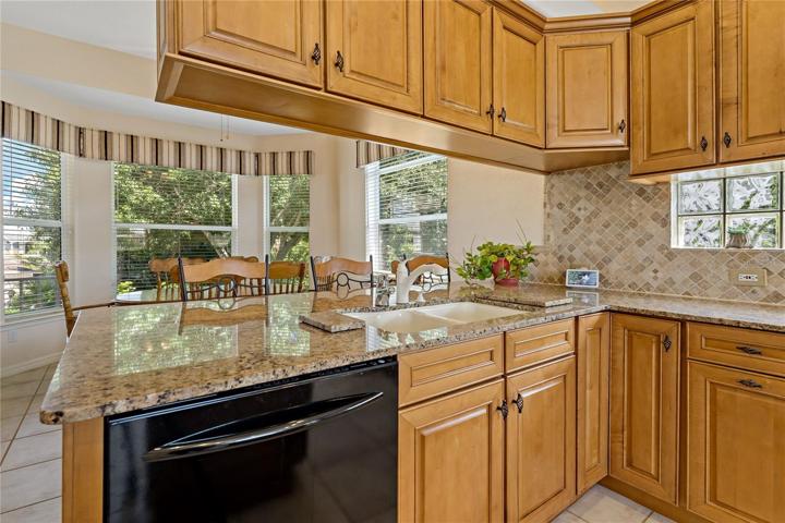 EAT-IN KITCHEN WITH GORGEOUS BAY WINDOWS!