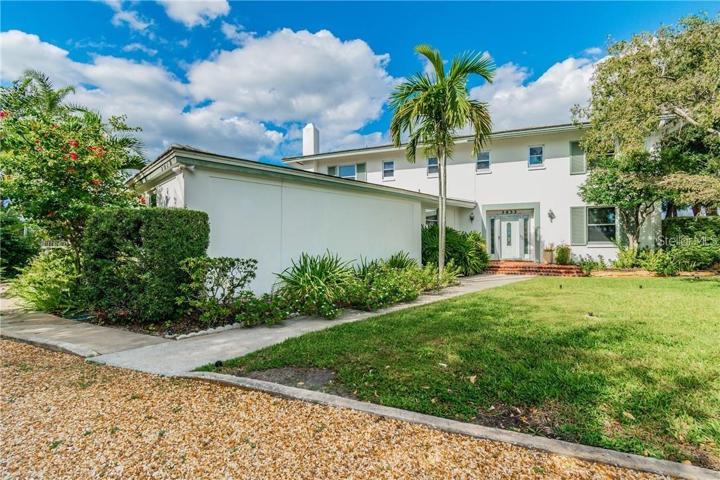 Spacious waterfront property featuring a beautifully designed home with an exceptional rear water lot.